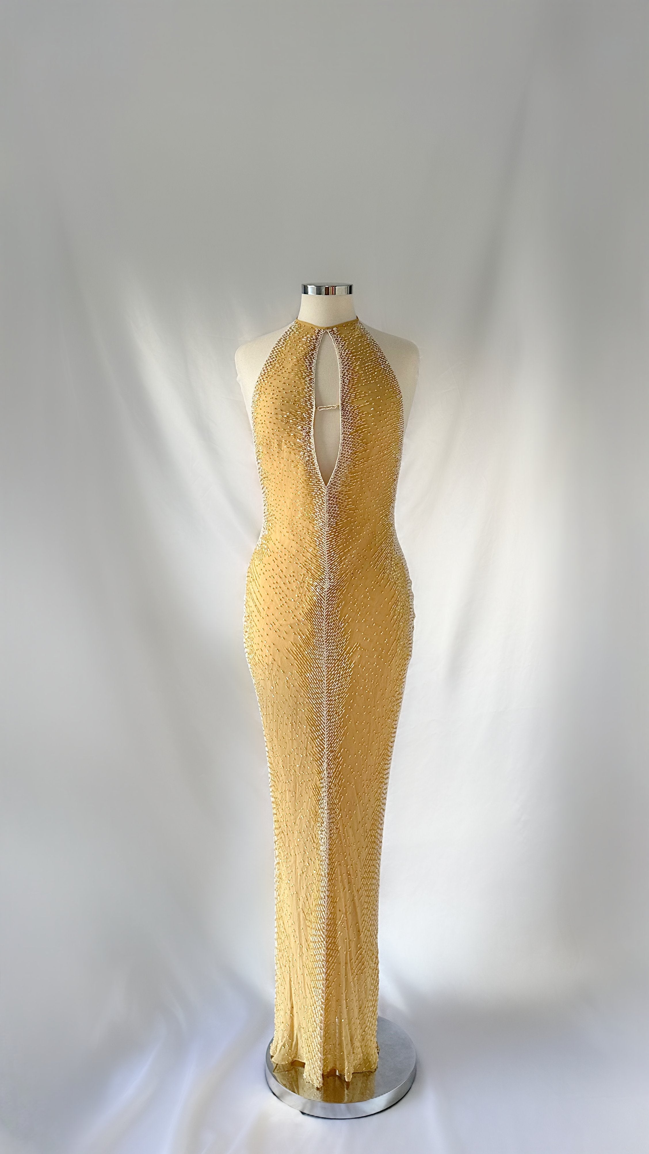 MUTED YELLOW EMBELLISHED HALTER GOWN